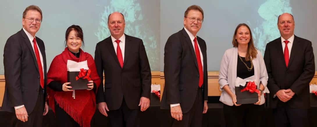 Dr. Emily Liu and Dr. Jen Pazour receiving their awards
